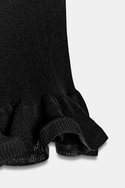 Top en maille à bas ondulé