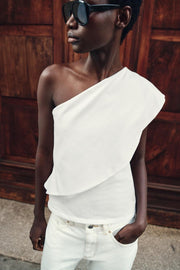 Top asymétrique en interlock