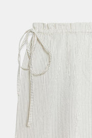 Pantalon bouffant à rayures et liens noués
