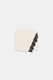 Jupe-culotte croisée en dentelle