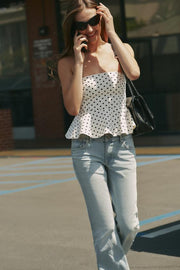 Top bustier peplum à pois
