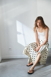 Jupe midi asymétrique à pois
