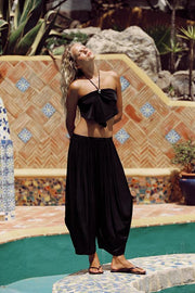 Pantalon bouffant à plis