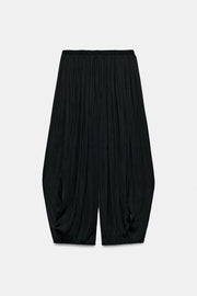 Pantalon bouffant à plis