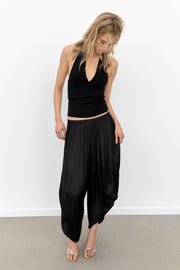 Pantalon bouffant à plis
