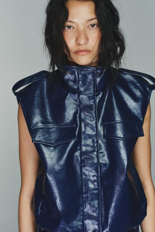 Gilet effet cuir à passants