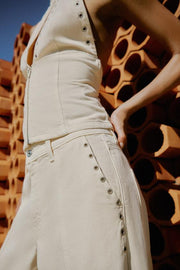 Pantalon coupe droite taille basse à œillets
