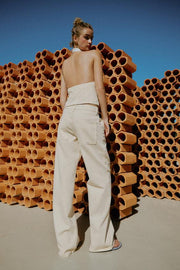 Pantalon coupe droite taille basse à œillets