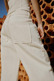 Pantalon coupe droite taille basse à œillets