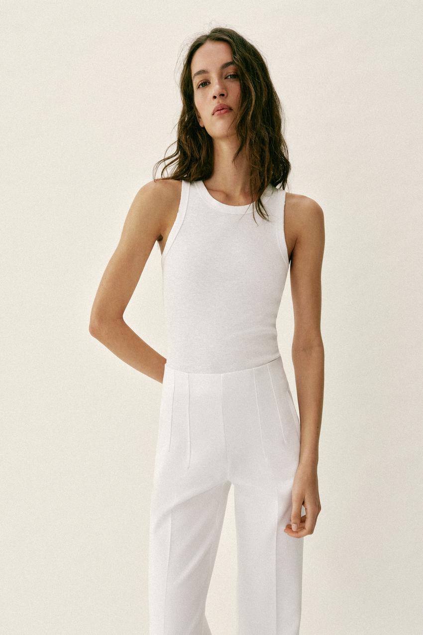 Pantalon taille haute à fermeture zippée au dos