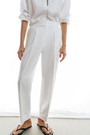 Pantalon à plis avec revers au bas