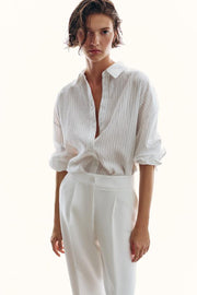 Pantalon à plis avec revers au bas