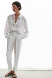 Pantalon à plis avec revers au bas