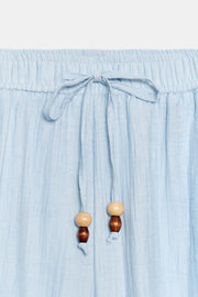 Pantalon coupe barrel texturé