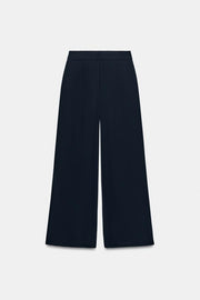 Pantalon palazzo à bouton doré