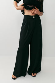 Pantalon palazzo à bouton doré