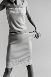 Jupe midi en maille et dentelle brodée
