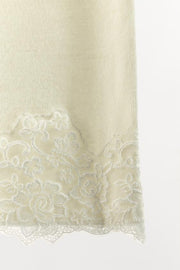 Jupe midi en maille et dentelle brodée