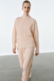 Jupe midi en maille effet froissé