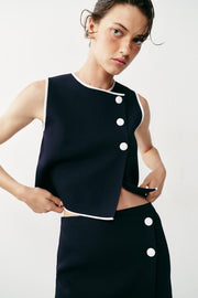 Top en maille à boutons contrastés