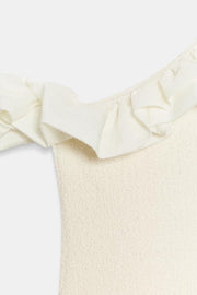 Top bouclé asymétrique
