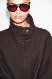 Manteau court cape en laine avec ceinture