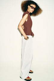 Top peplum à pinces