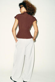 Top peplum à pinces