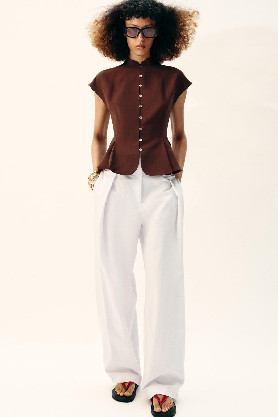 Top peplum à pinces