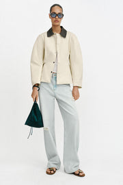 Blouson peplum à col contrasté