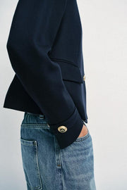 Blazer cintré à bouton doré