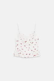 Top satiné à volants et motif fraises