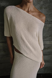 Top asymétrique en maille