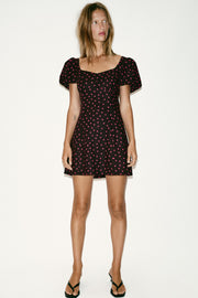 Robe à pois à manches bouffantes en lin