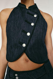 Gilet dos-nu à passepoils contrastés