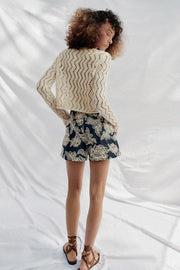 Veste en maille ajourée zigzag