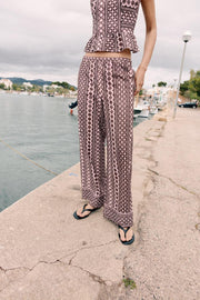 Pantalon large à broderies ajourées