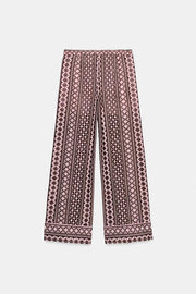 Pantalon large à broderies ajourées
