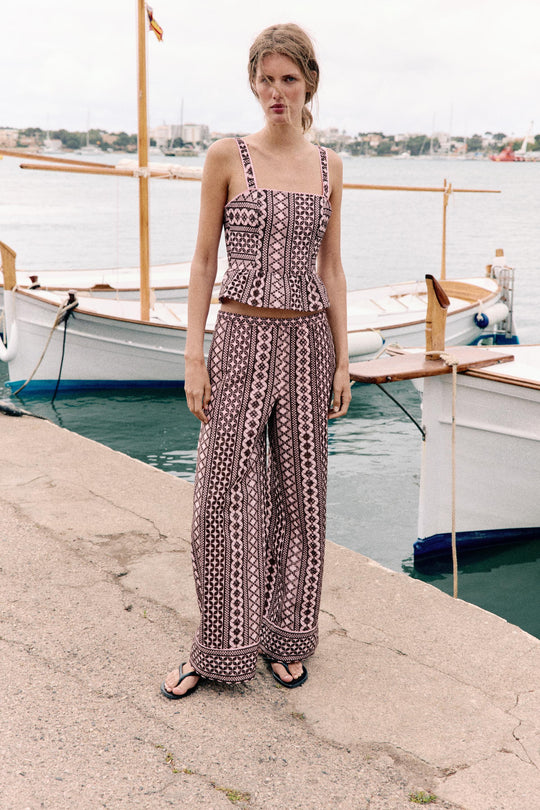 Pantalon large à broderies ajourées