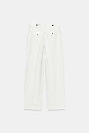 Pantalon à boutons métalliques