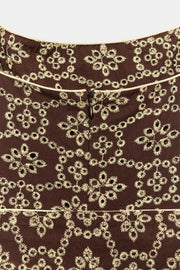 Combinaison brodée ajourée avec ceinture