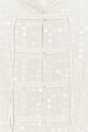 Top à broderies ajourées et brandebourgs