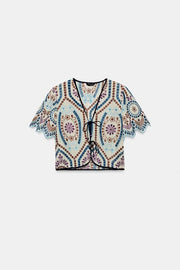 Top court à broderies ajourées