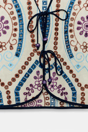 Top court à broderies ajourées