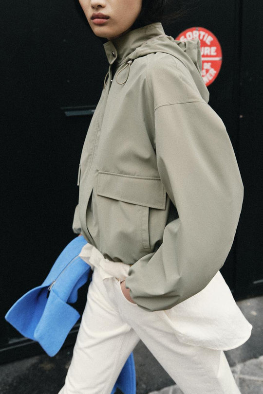 Blouson enduite à capuche