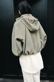 Blouson enduite à capuche