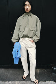 Blouson enduite à capuche