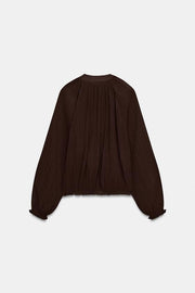Veste en organza plissée