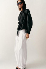 Veste avec ceinture effet cuir