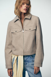 Veste douce à fermeture zippée